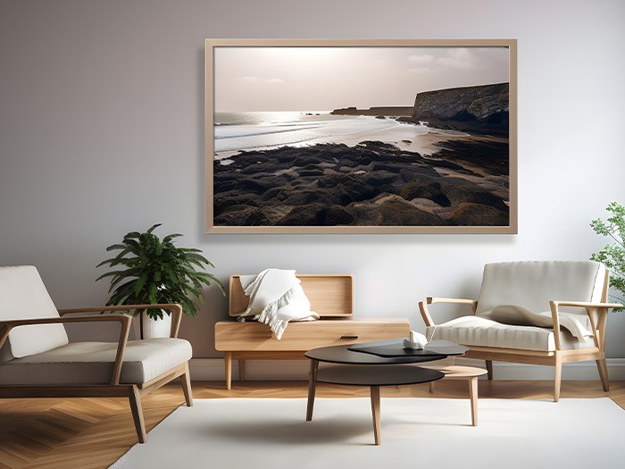 Small living room featuring a large wall art piece, accent chairs, and coffee table.